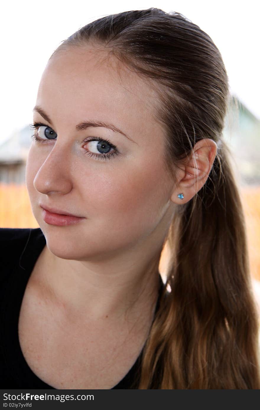 Closeup portrait of a beautiful young woman