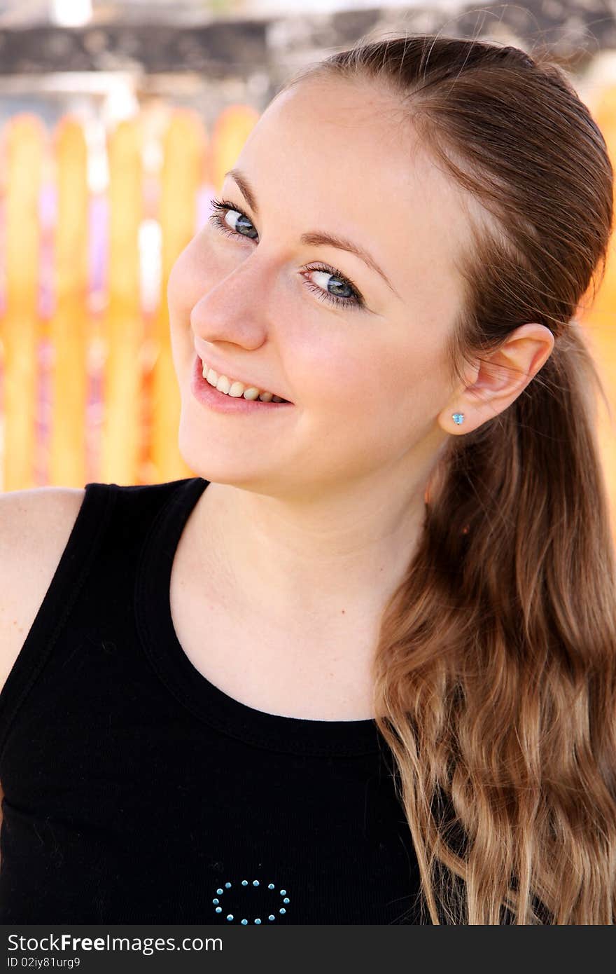 Closeup portrait of a beautiful young woman