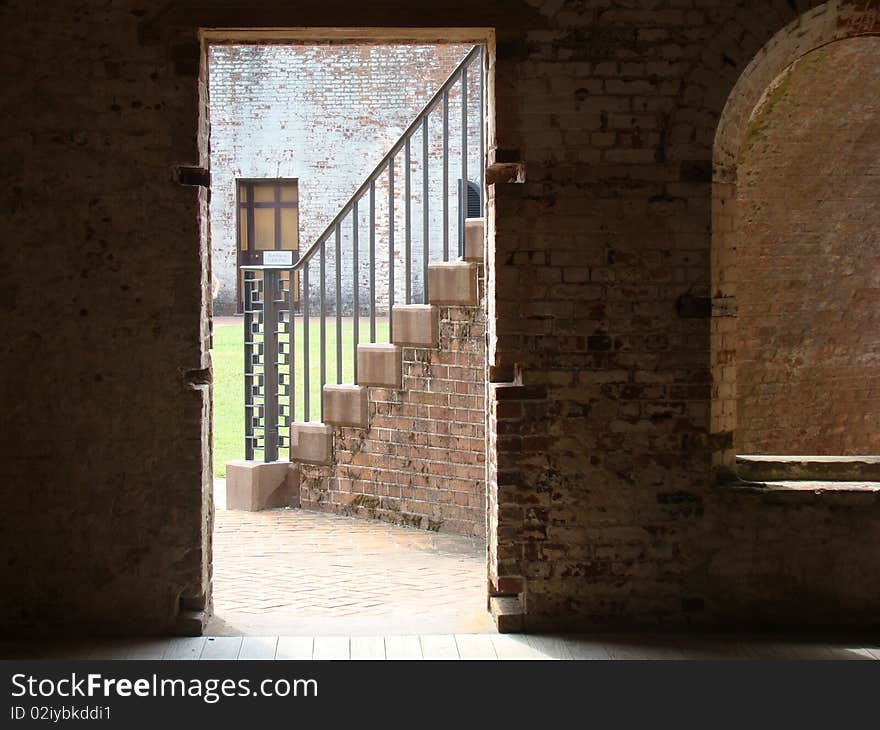 Barracks doorway opening to stairway to upperlevel of Fort Macon NC. Barracks doorway opening to stairway to upperlevel of Fort Macon NC