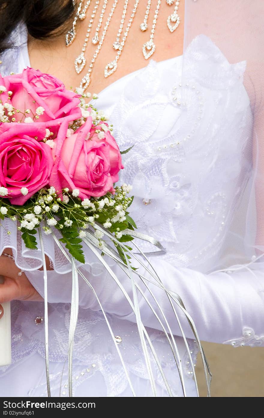 Beautiful bridal bouquet in the hands of the bride