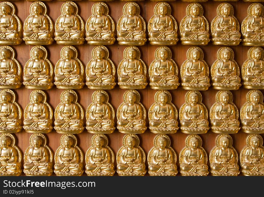 Ten thousand buddha on Chinese temple wall