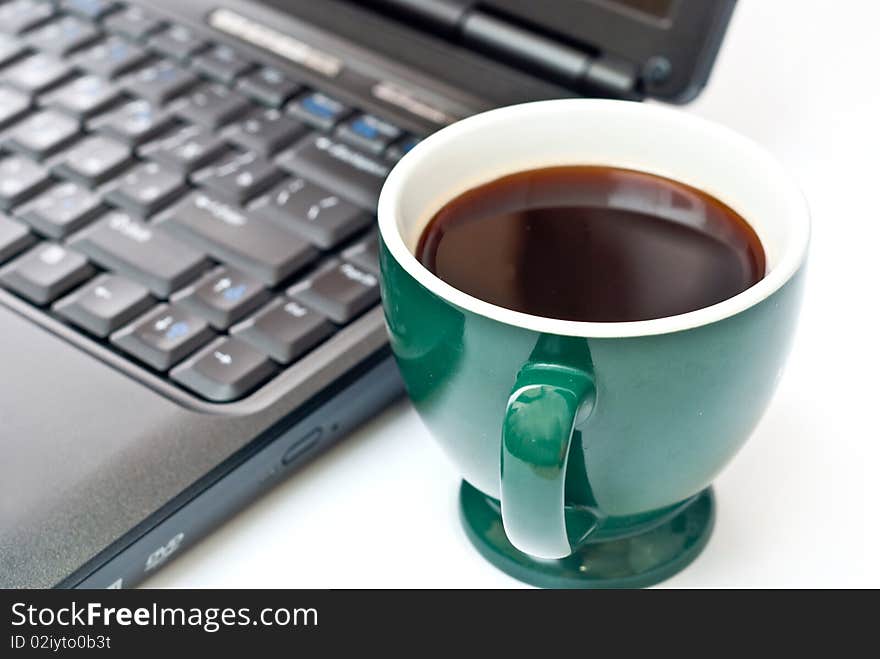 Business office scenario, keyboard and coffee on work surface. Business office scenario, keyboard and coffee on work surface