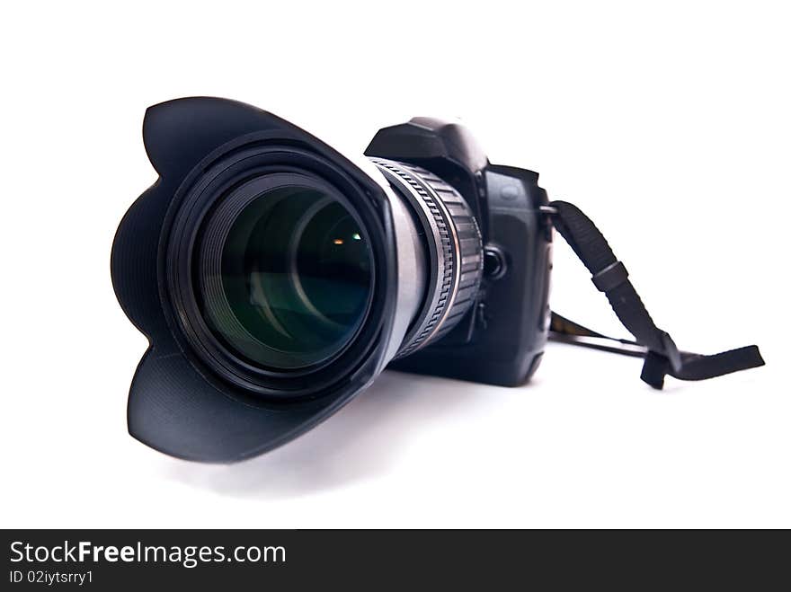 Modern camera with zoom lens isolated on white background