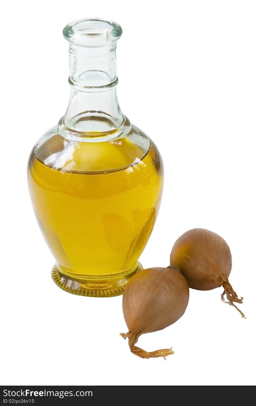 Bottle of olive oil with onion, isolated