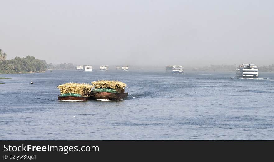 Cruise ships and crop boat on the Nile River. Cruise ships and crop boat on the Nile River