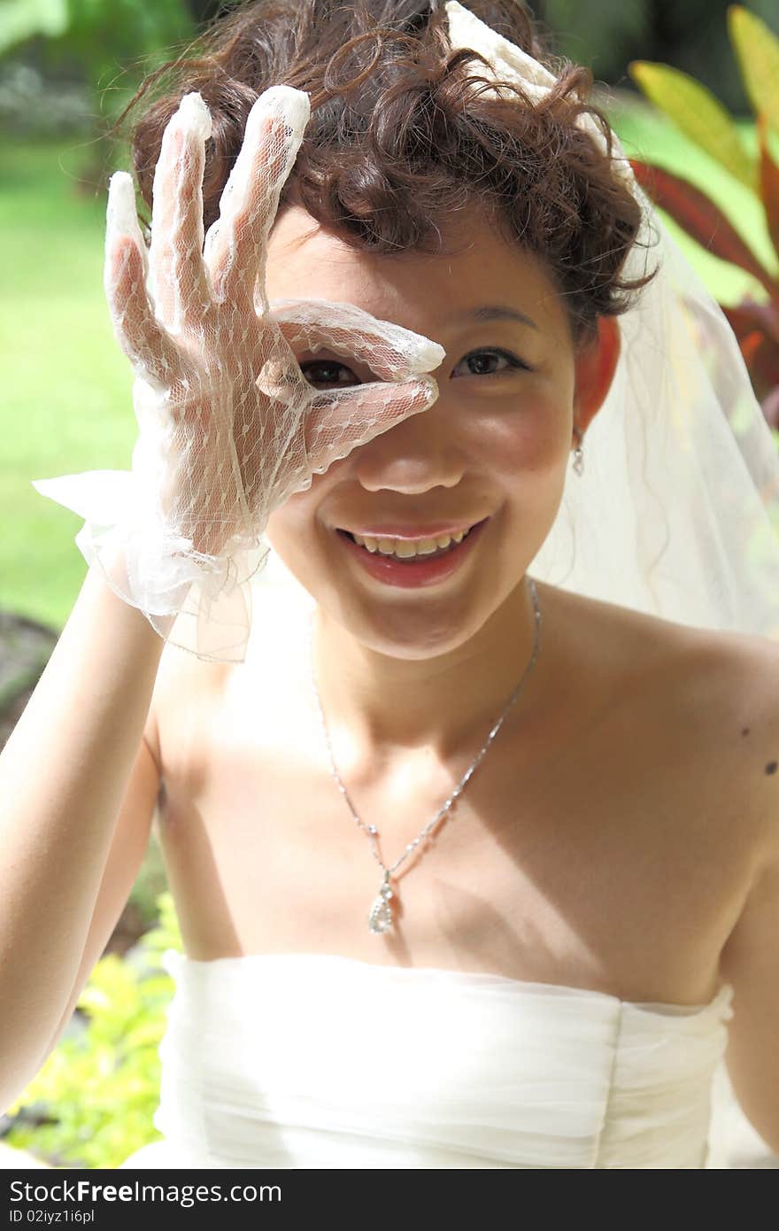 A happy asian bride with beautiful wedding dress