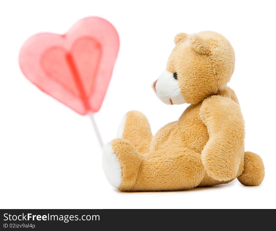 Small cute brown bear with red heart. Small cute brown bear with red heart