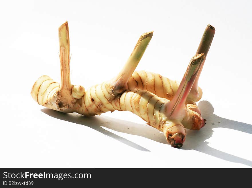 Ginger root on a white background, Thailand. Ginger root on a white background, Thailand.