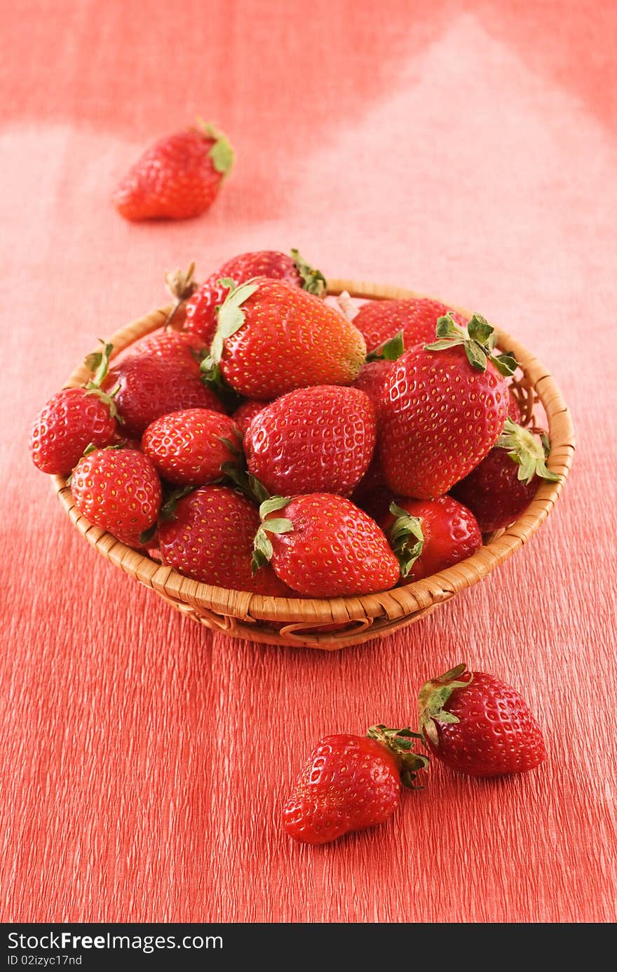 Full wicker basket with fresh strawberries