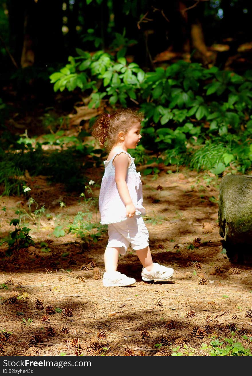 A little baby girl in the forest. A little baby girl in the forest