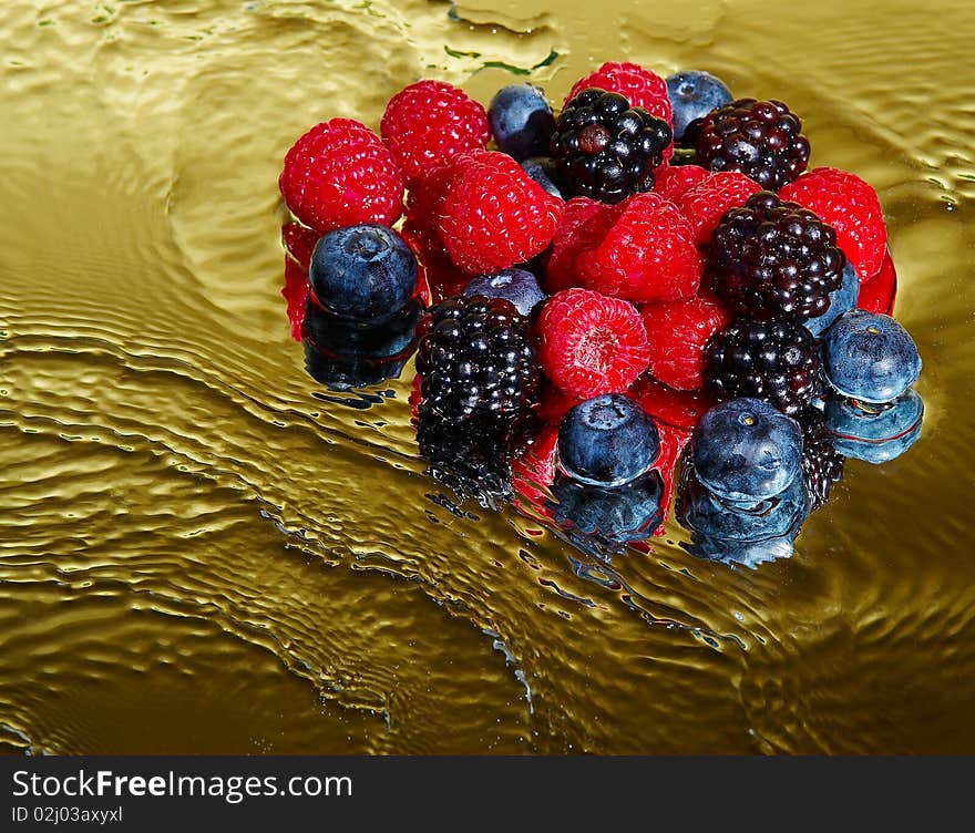 Fresh berries mixed with golden waves. Fresh berries mixed with golden waves