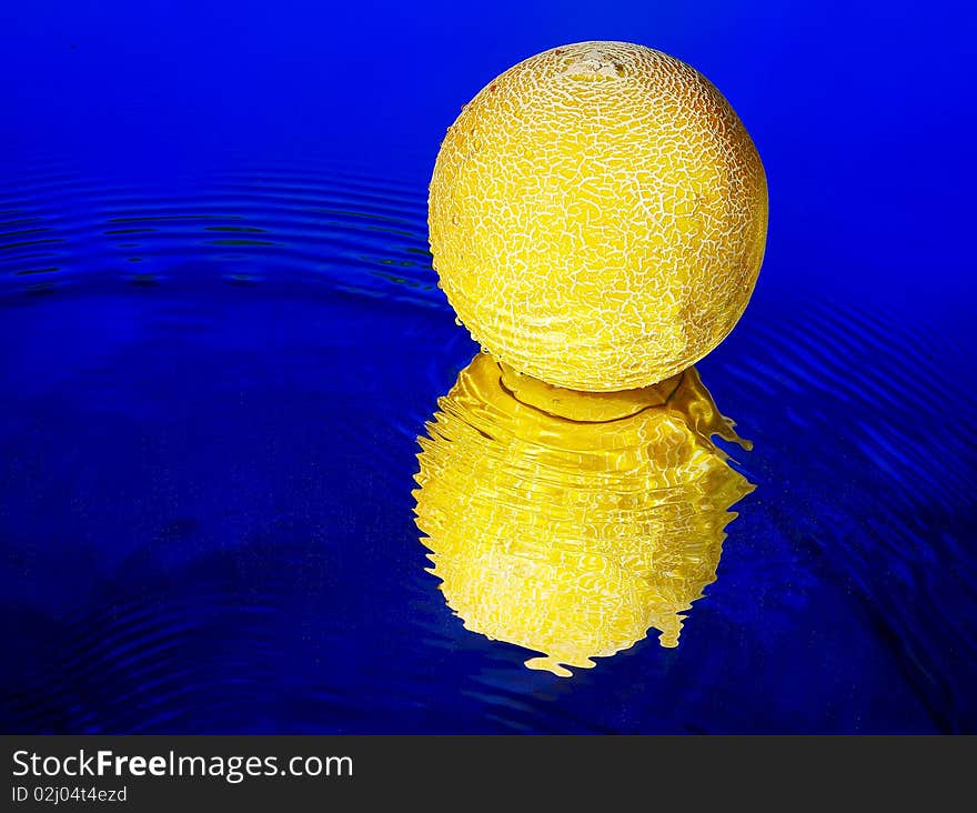 Melon yellow on a blue background. Melon yellow on a blue background