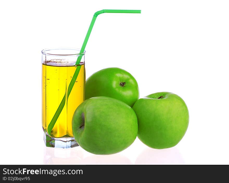 Glass of apple juice with green apples isolated on white background