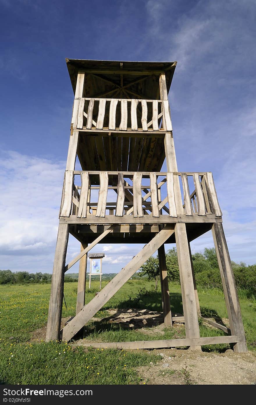 Wooden watchtower in the ornithological park