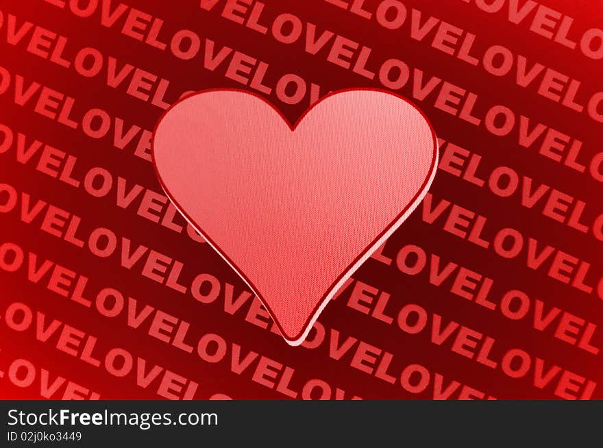 Abstract red love illustration with a big heart symbol in the center with as background small love text