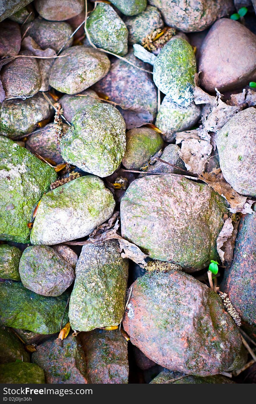 Pebble stones in sunny day great as a background