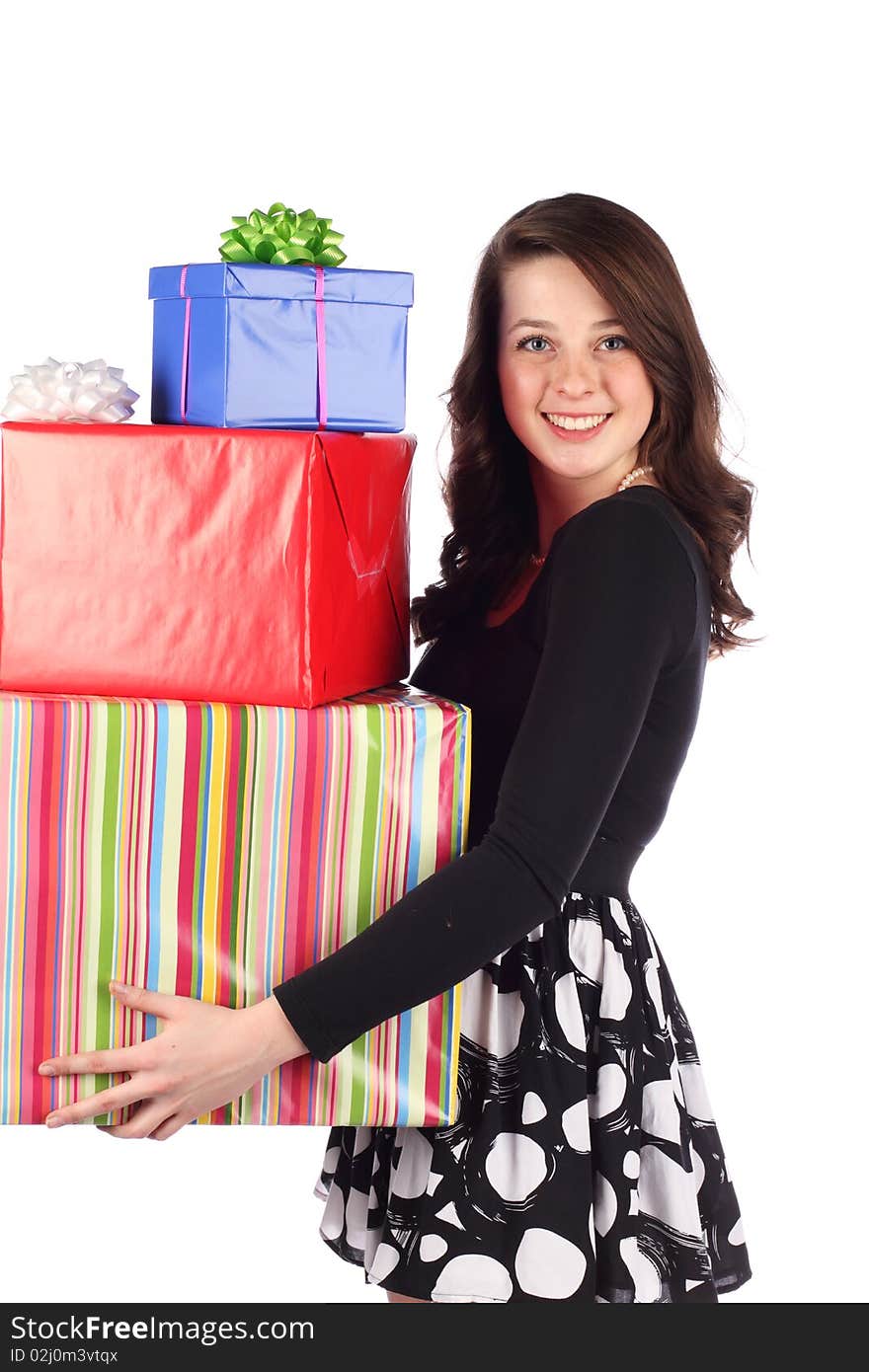 Happy woman carrying lots of presents. Happy woman carrying lots of presents