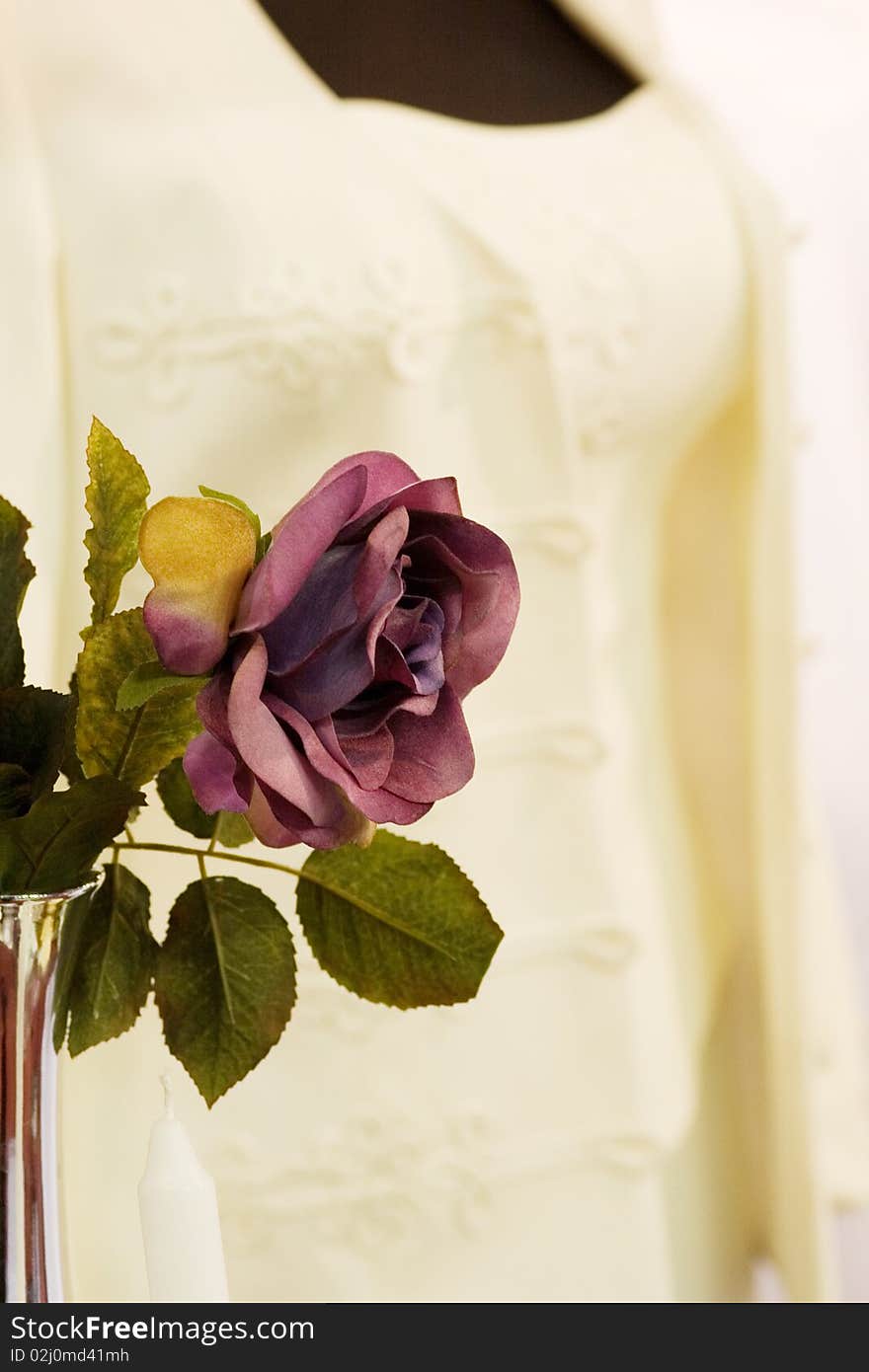 Red rose and an elegant costume