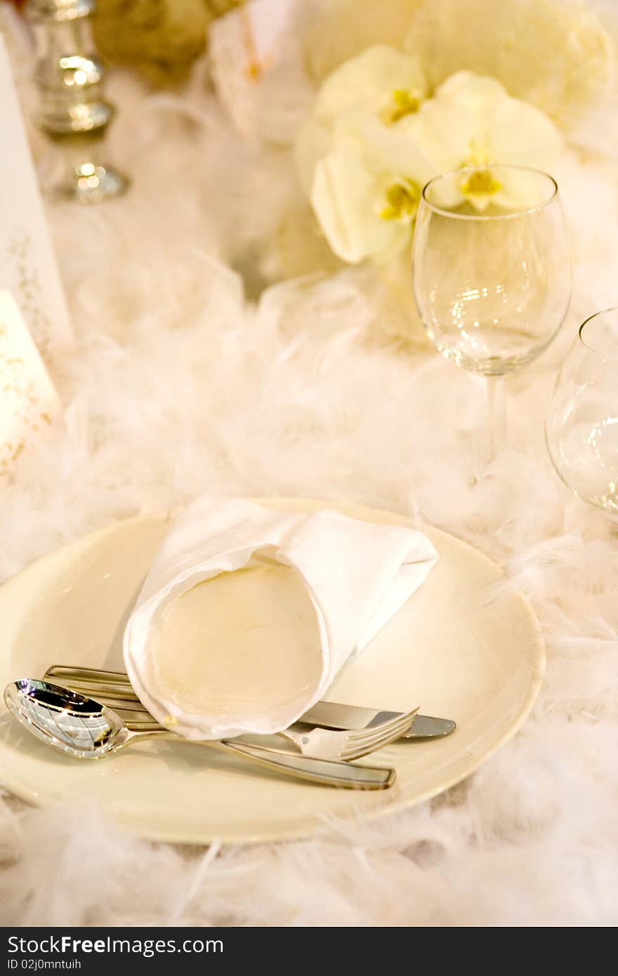 Dinner table with yellow flowers