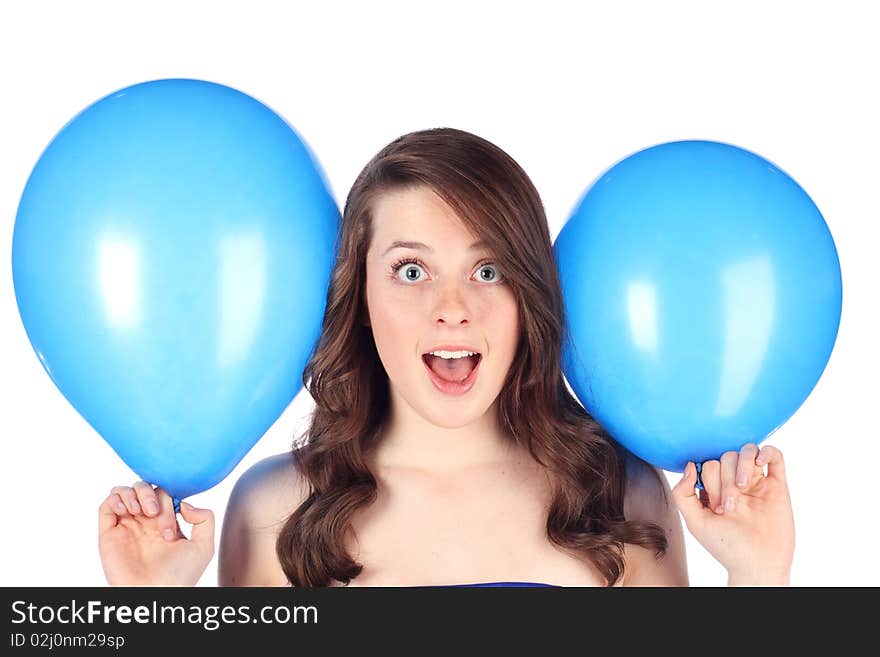 Happy and excited teen with blue balloons