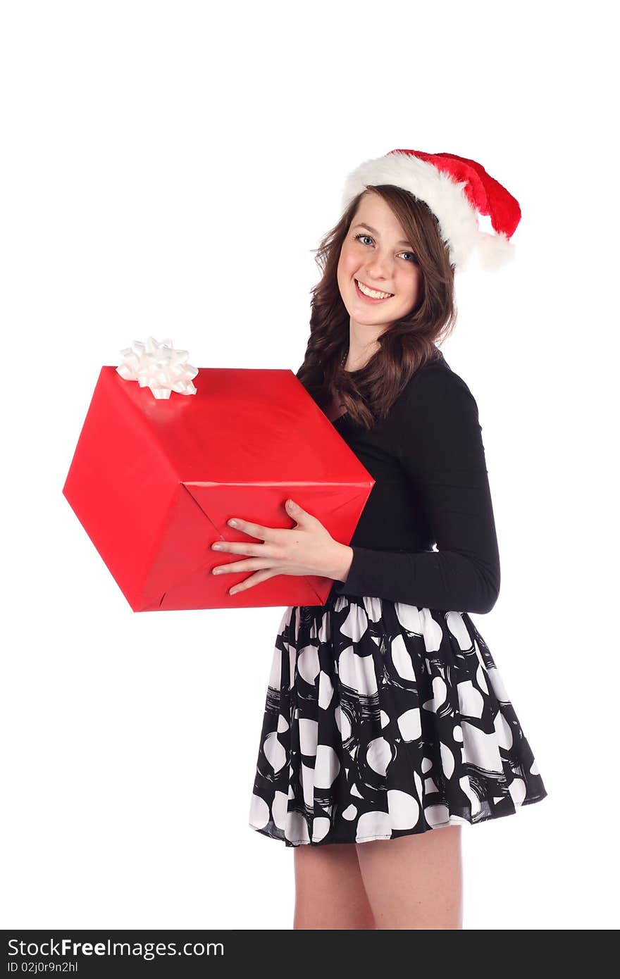 Attractive teen with present on a white background