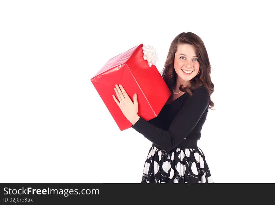 Attractive teen with present on a white background