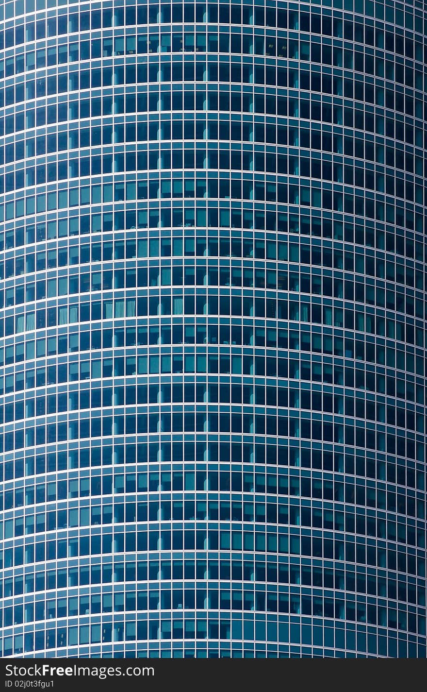 Blue office building windows background