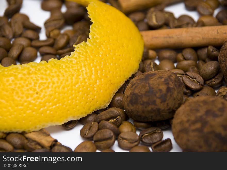 Citrus peel and truffles on coffee beans