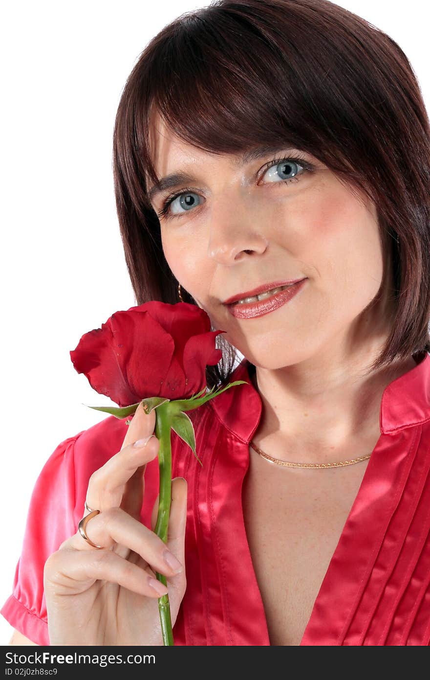 Beautiful woman in love holding a red rose isolated over a white background. Beautiful woman in love holding a red rose isolated over a white background