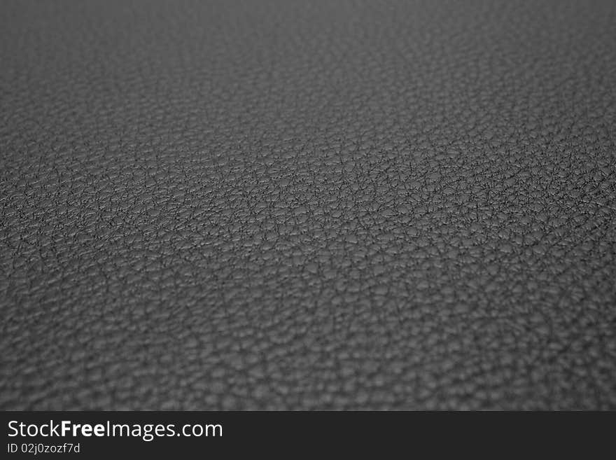 Black leather close up (shallow DOF)