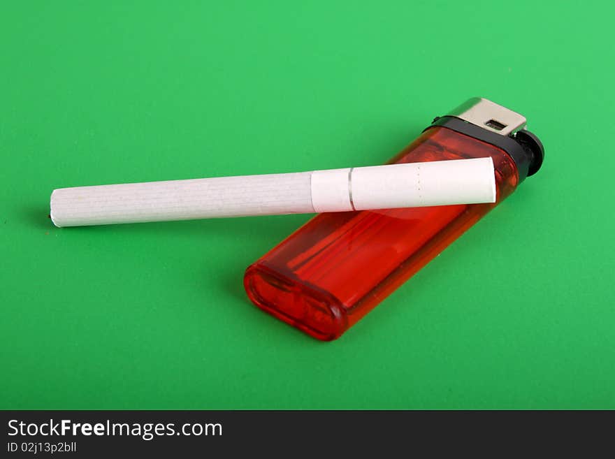 One cigarette with lighter