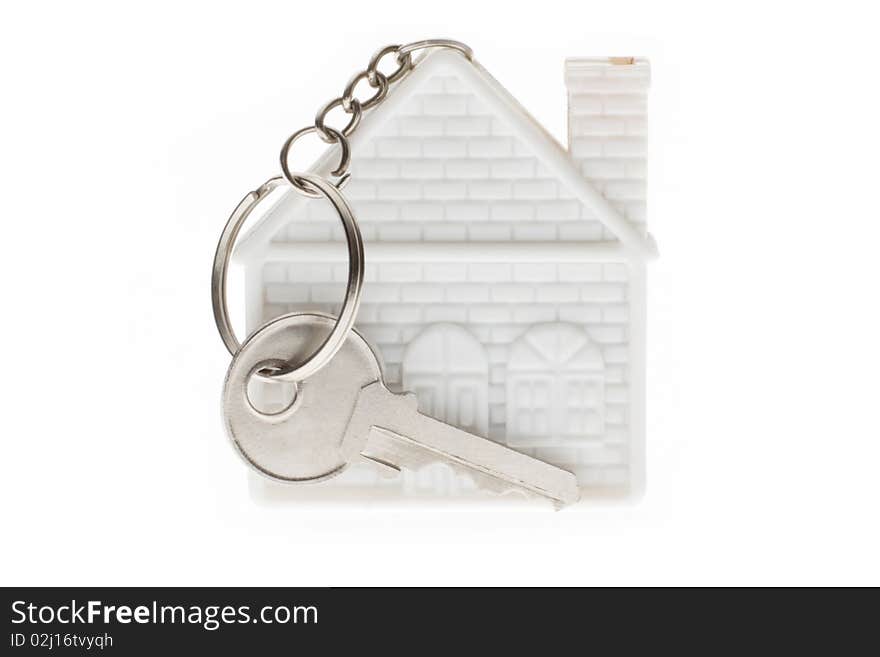 Keychain in the form of home and the key