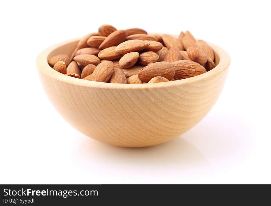 Bowl of almonds on white