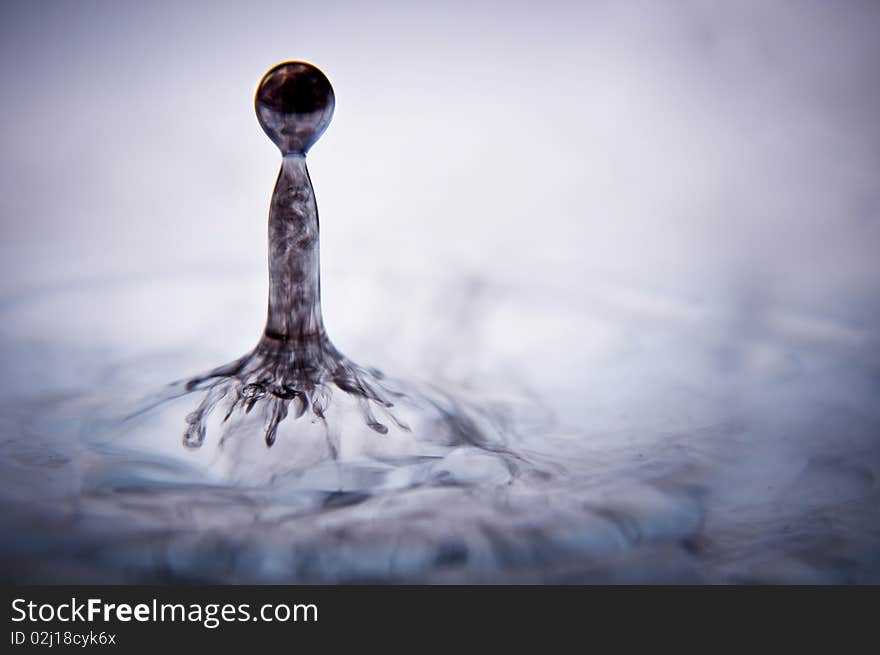 Droplet of water stained in black. Droplet of water stained in black