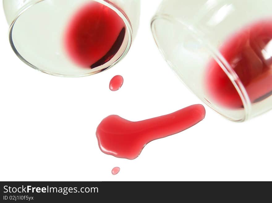 Red wine spilled from glasses