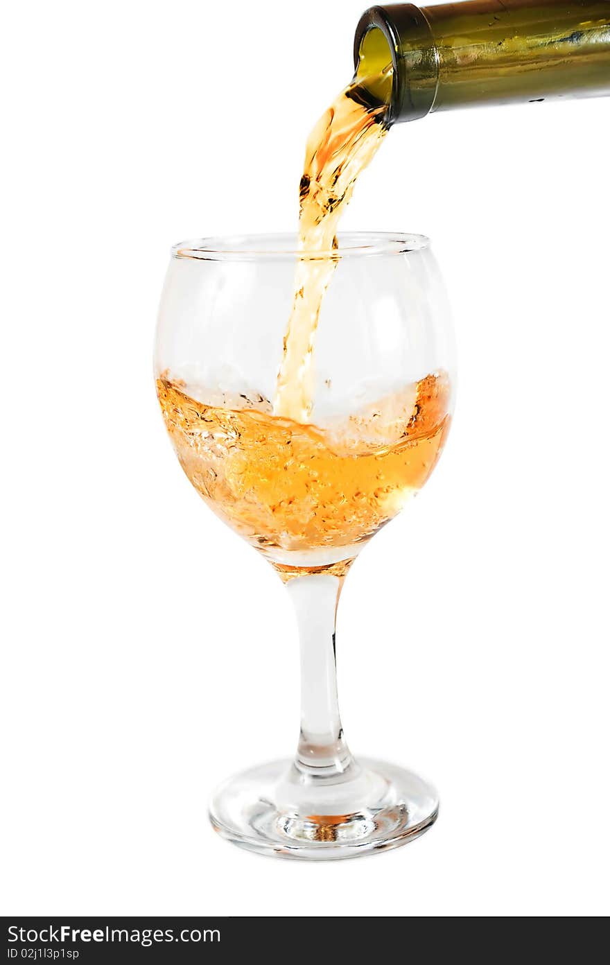 White wine pouring down from a wine bottle against white background