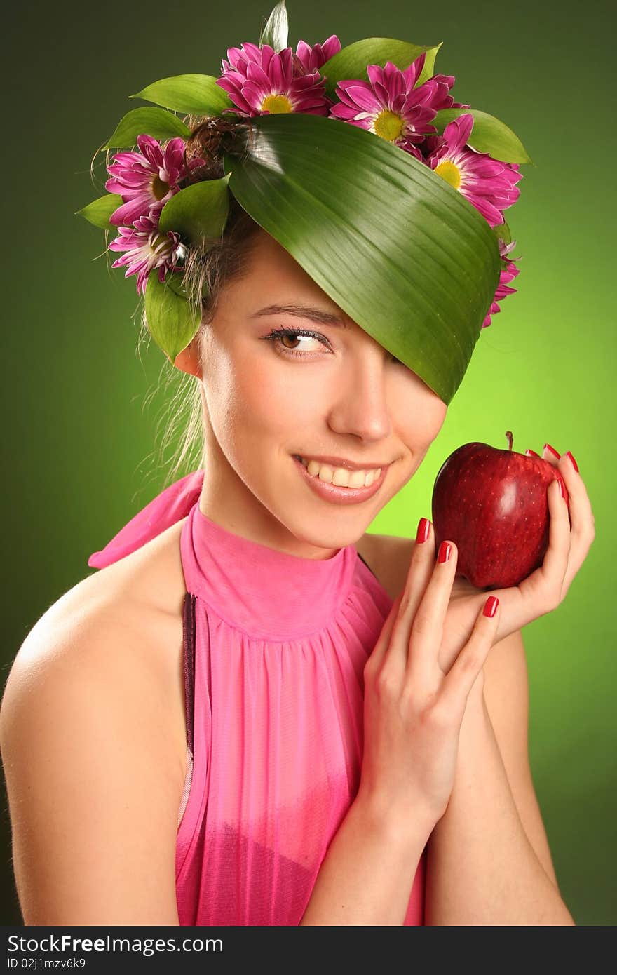 Beautiful spring-woman with red apple. Beautiful spring-woman with red apple