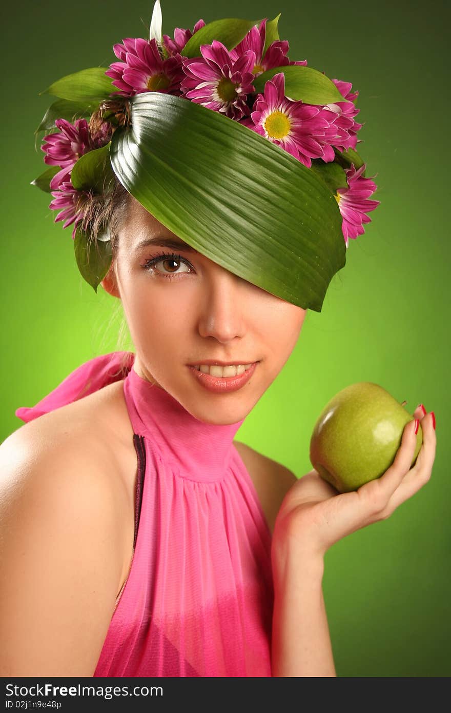 Beautiful spring-woman with green apple. Beautiful spring-woman with green apple