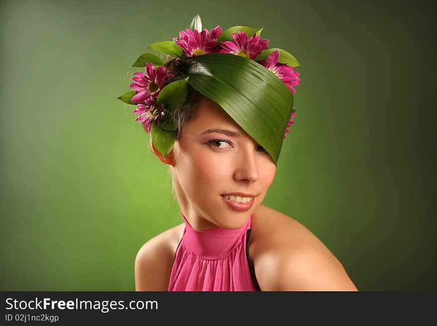 Beautiful spring-woman on green background. Beautiful spring-woman on green background