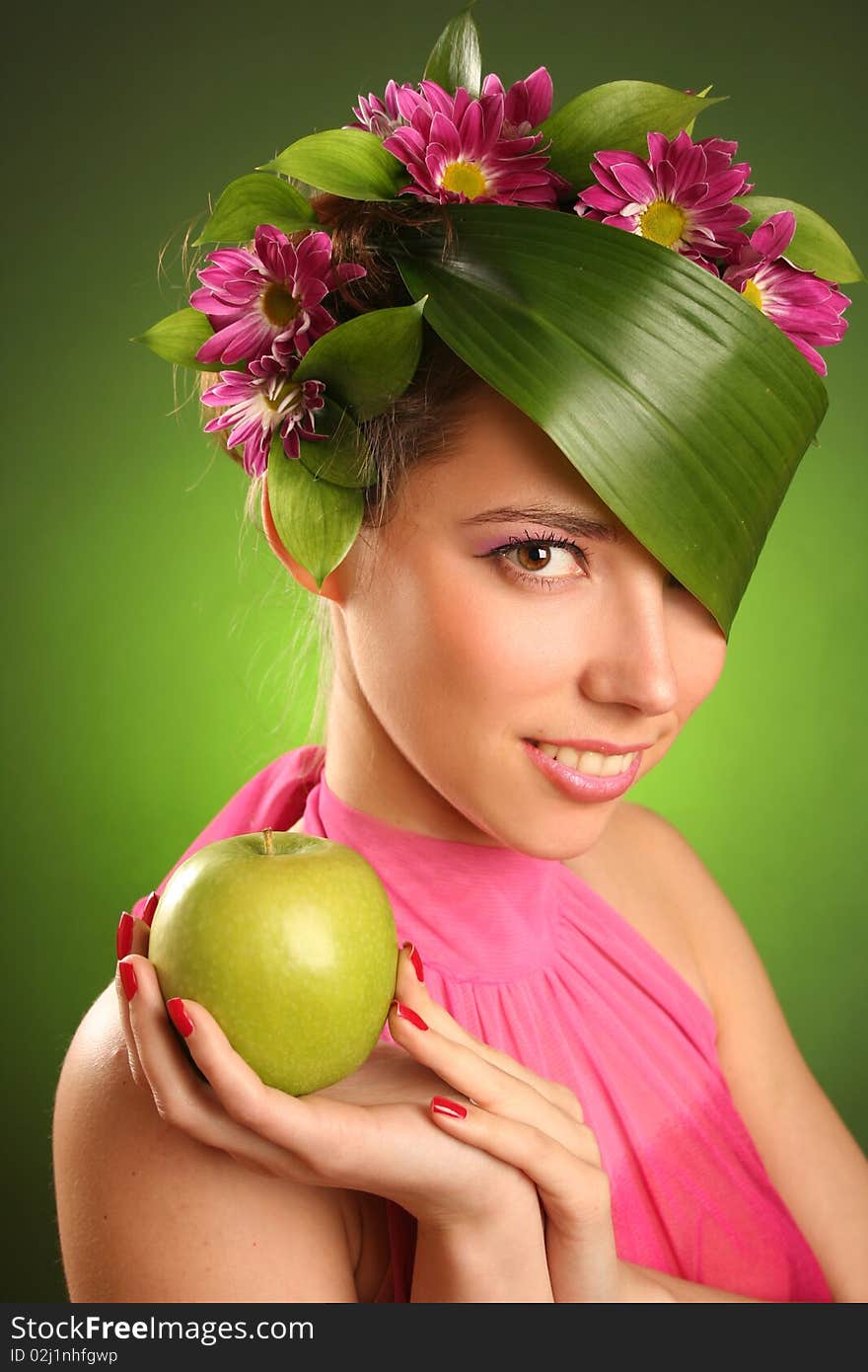 Beautiful spring-woman with green apple