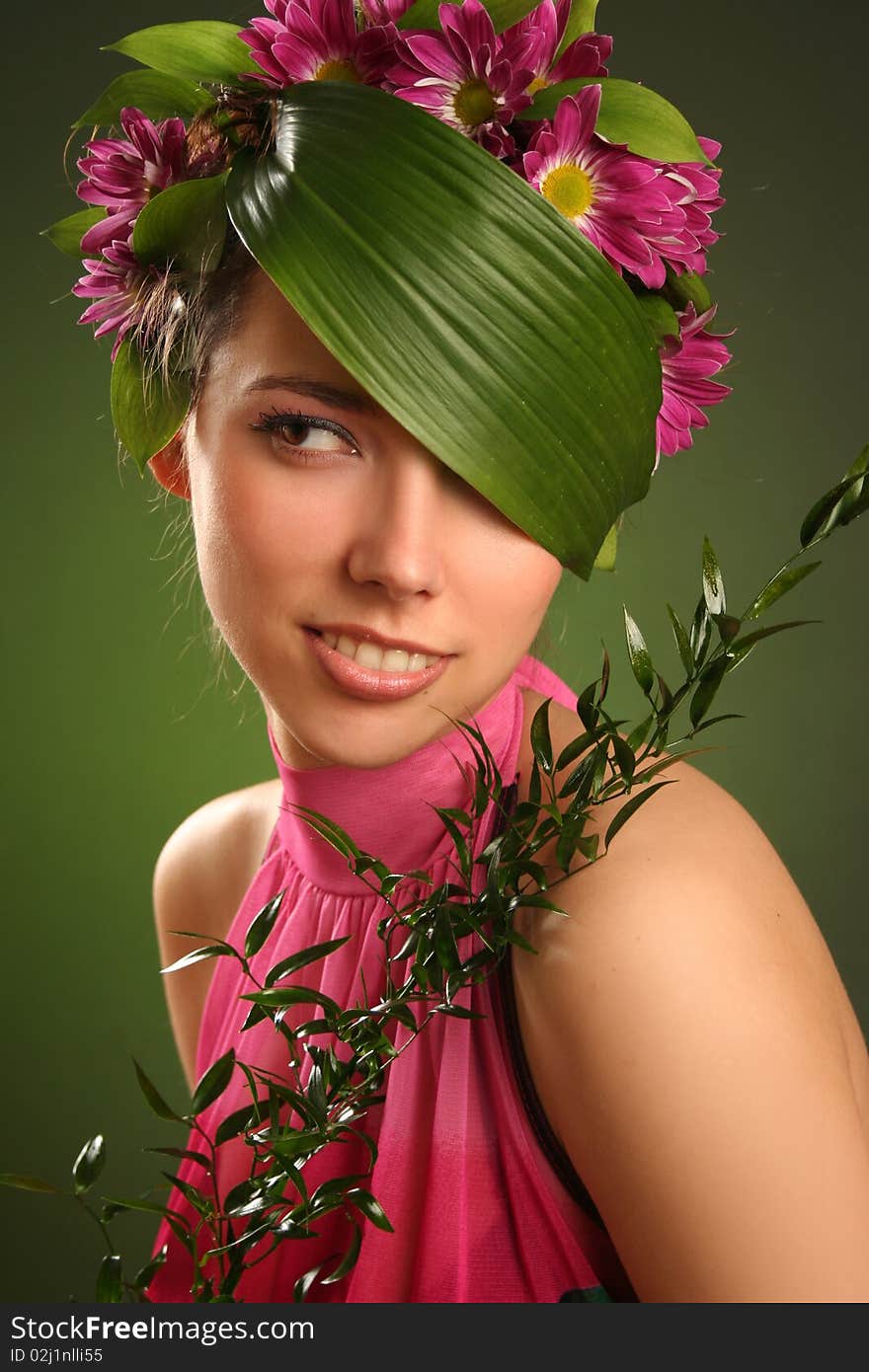 Beautiful spring-woman on green background. Beautiful spring-woman on green background