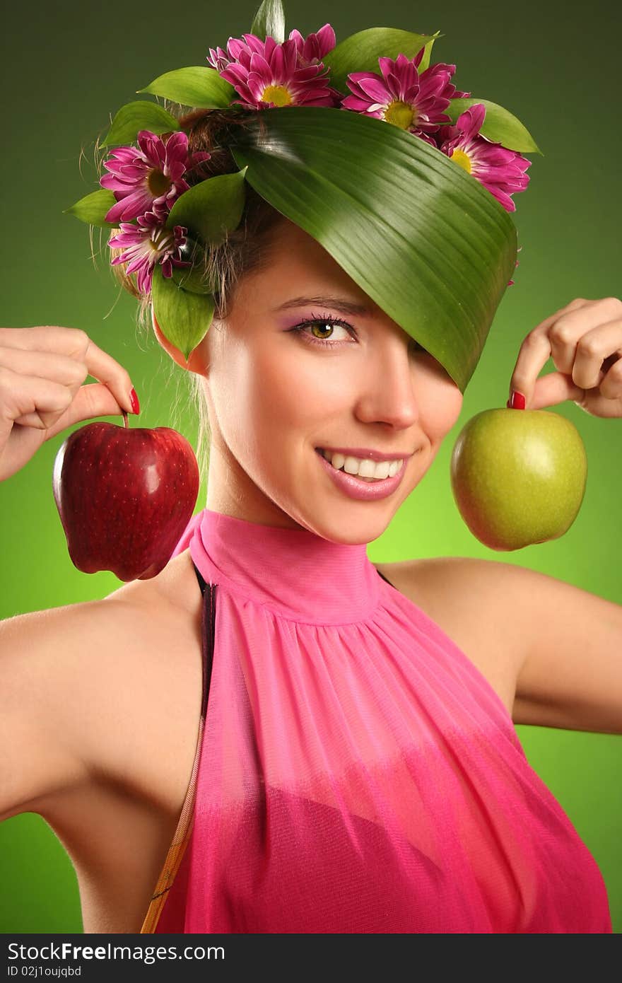 Beautiful spring-woman with two apples. Beautiful spring-woman with two apples