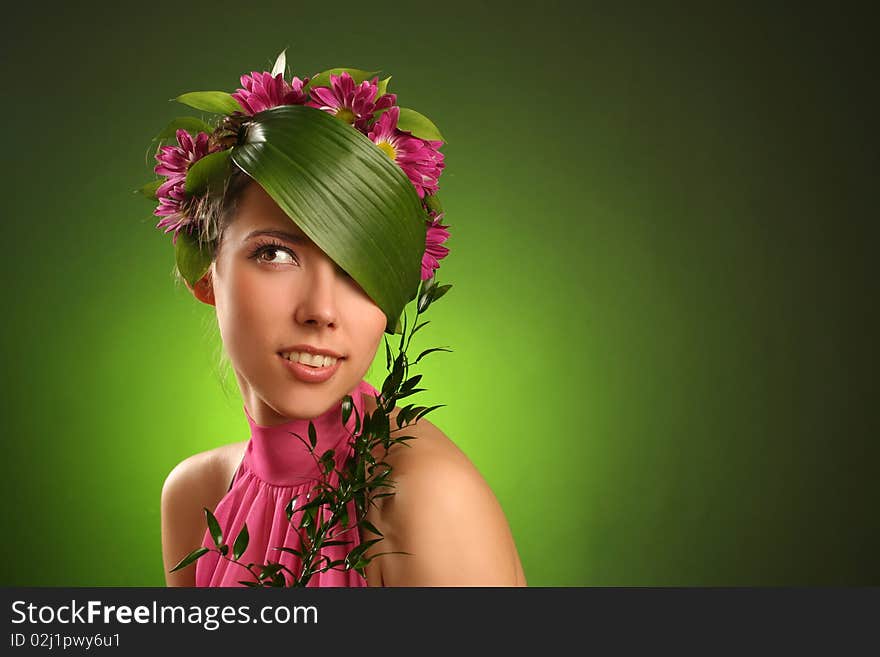 Beautiful spring-woman on green background. Beautiful spring-woman on green background