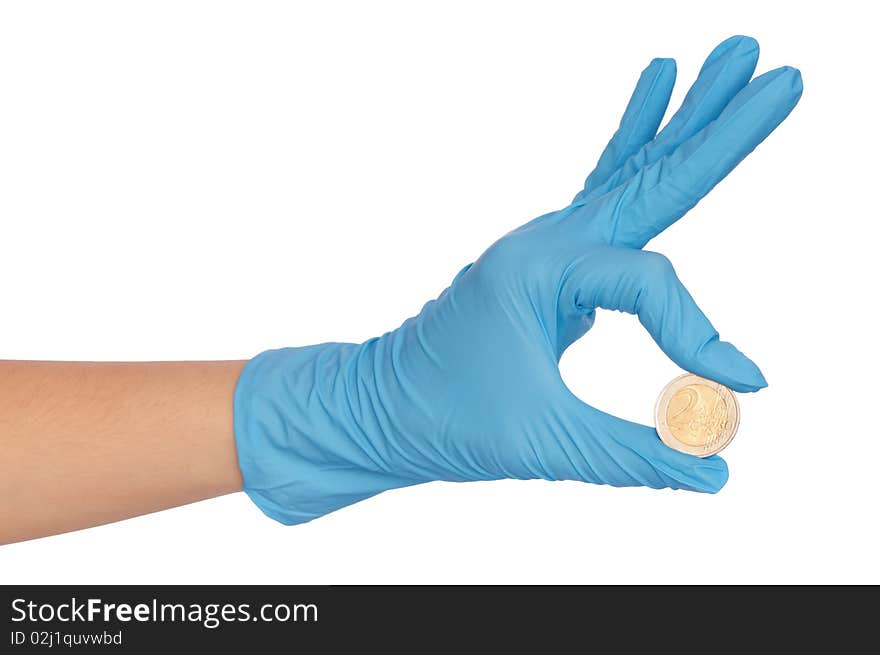 Doctor holding fake of two euro coin in the hand