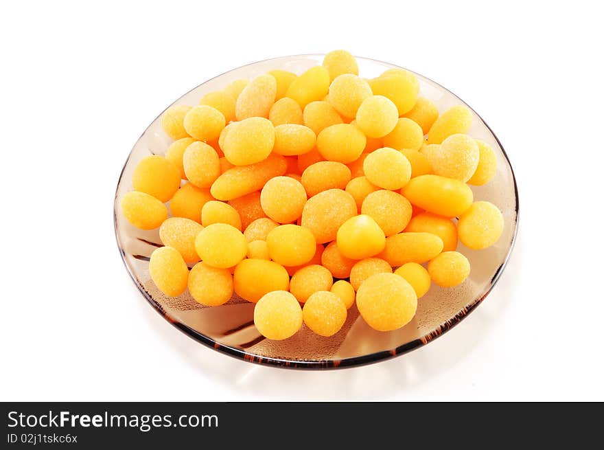 Dried apricots in sugar isolated on a white background. Dried apricots in sugar isolated on a white background