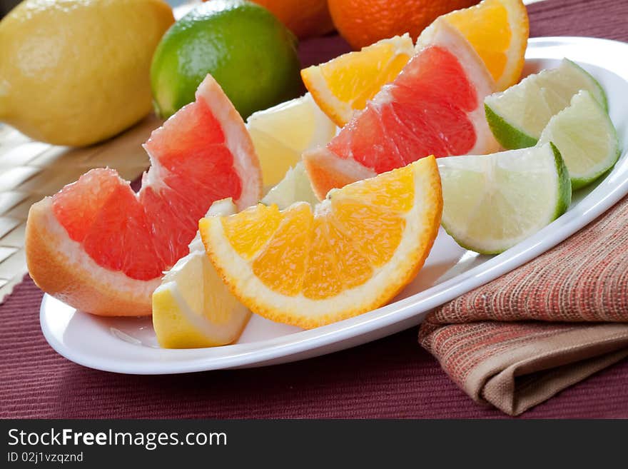 Arrangement of lemon, lime, tangerine, orange and grapefruit fruit. Arrangement of lemon, lime, tangerine, orange and grapefruit fruit