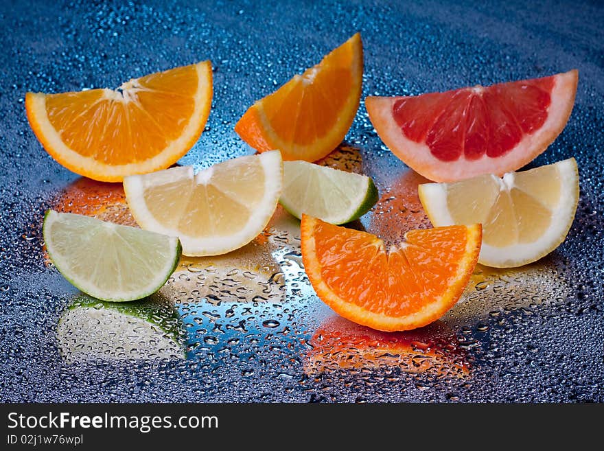 Arrangement of lemon, lime, tangerine, orange and grapefruit fruit. Arrangement of lemon, lime, tangerine, orange and grapefruit fruit