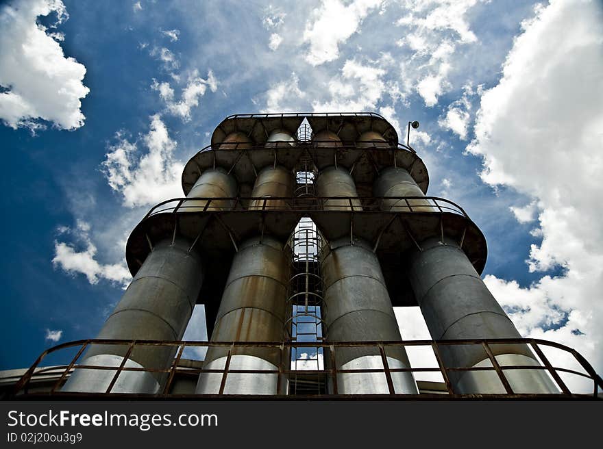 Factory stacks and blue sky