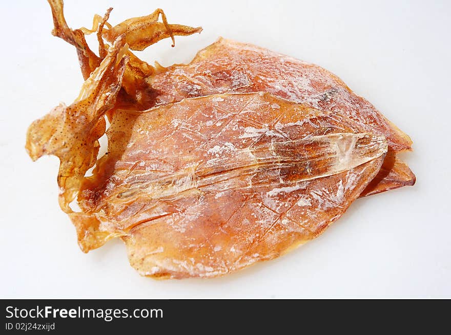 Close up of dried squids with white background