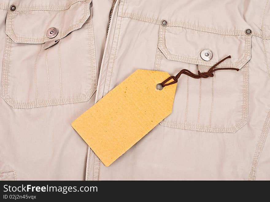 Cloth with tag. Jacket fragment